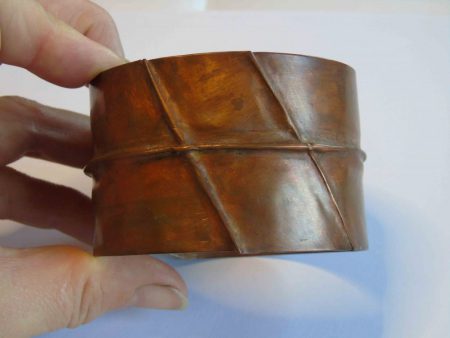 overlapping bracelet with diagonal folds