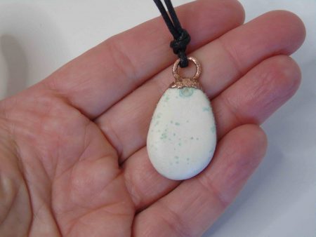 white stone with green dots electrformed necklace