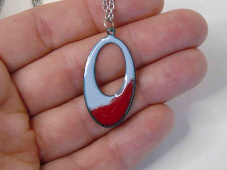 oval with hole grey and red necklace
