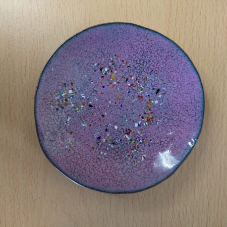 Handmade pink enamelled copper bowl or dish. The bowl has a spotty effect, plus colourful spots